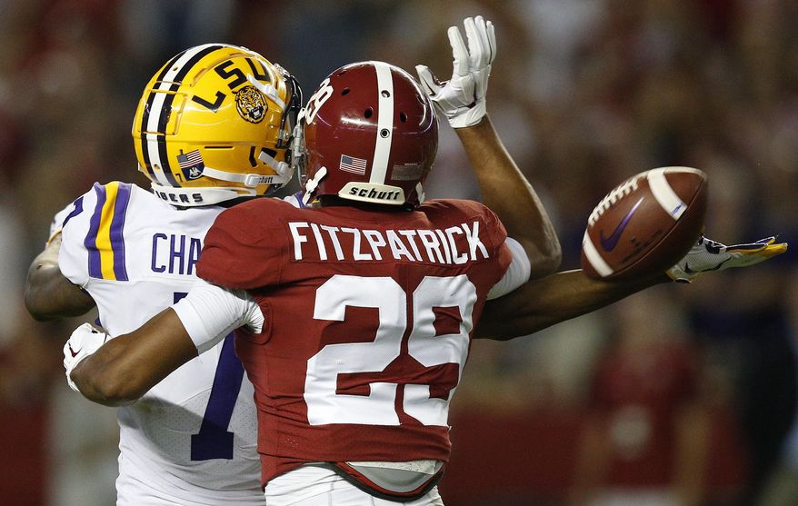 LSU wide receiver D.J. Chark misses the pass as Alabama defensive back Minkah Fitzpatrick defends during the first half of an NCAA college football game, Saturday, Nov. 4, 2017, in Tuscaloosa, Ala. (AP Photo/Brynn Anderson)
