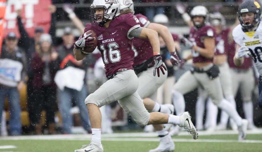 Montana wide receiver Jerry Louie-McGee (16) returns a punt for a touchdown against Northern Arizona in the first half of an NCAA college football game Saturday, Nov. 4, 2017, in Missoula, Mont. (AP Photo/Patrick Record)