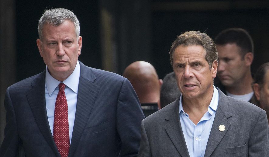 In this photo from Sunday, Sept. 18, 2016, New York Mayor Mayor Bill de Blasio, left, and  Gov. Andrew Cuomo walk near the scene of an explosion in Manhattan&#39;s Chelsea neighborhood, in New York. (AP Photo/Craig Ruttle, File)
