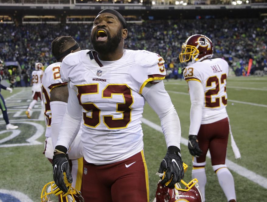 Washington Redskins inside linebacker Zach Brown celebrates a play in the second half of an NFL football game against the Seattle Seahawks, Sunday, Nov. 5, 2017, in Seattle. (AP Photo/Stephen Brashear) ** FILE **