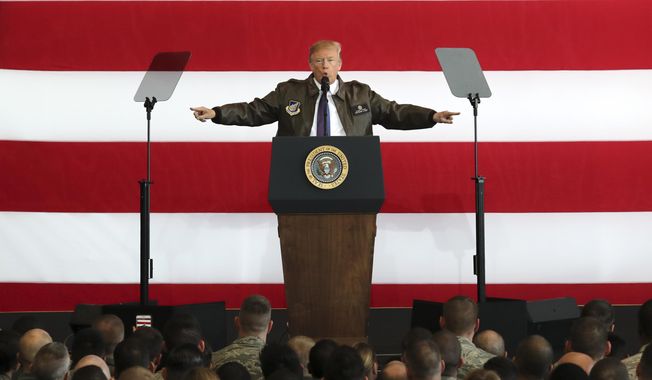 U.S. President Donald Trump delivers a speech for the U.S. troops at the U.S. Yokota Air Base, on the outskirts of Tokyo, Sunday, Nov. 5, 2017.  President Trump arrived in Japan Sunday on a five-nation trip to Asia, his second extended foreign trip since taking office and his first to Asia. The trip will take him to Japan, South Korea, China, Vietnam and Philippines for summits of the Asia-Pacific Economic Cooperation (APEC) and the Association of Southeast Asian Nations (ASEAN). (AP Photo/Eugene Hoshiko)