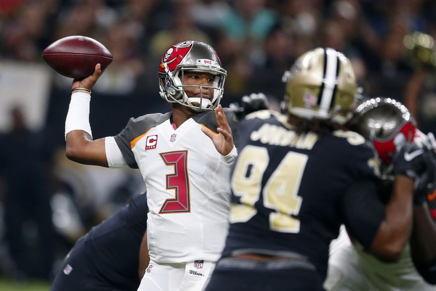 Tampa Bay Buccaneers quarterback Jameis Winston (3) passes under pressure from New Orleans Saints defensive end Cameron Jordan (94) in the first half of an NFL football game in New Orleans, Sunday, Nov. 5, 2017. (AP Photo/Butch Dill)