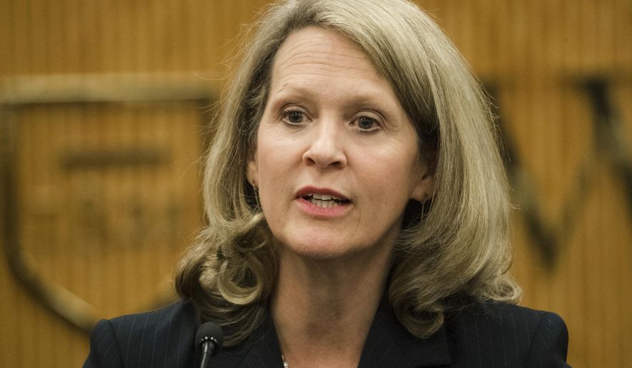 FILE – In this Oct. 25, 2017, file photo, Pennsylvania Supreme Court Justice Sallie Mundy, a Republican, debates Democratic challenger Dwayne Woodruff, an Allegheny County Court of Common Pleas judge, at Widener University's Commonwealth Law School in Harrisburg, Pa. Pennsylvania voters will reshape the state's appeals courts during the Tuesday, Nov. 7, 2017, general election, considering a change to the state constitution and picking winners of races for mayor, district attorney and other local contests, in what's considered an off-year election. (AP Photo/Matt Rourke, File)