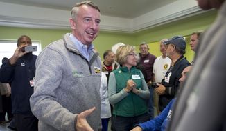 Ed Gillespie, Republican candidate for Virginia governor, did some last-minute campaigning on Monday before facing off against Democrat Ralph Northam at the polls. (Associated Press)
