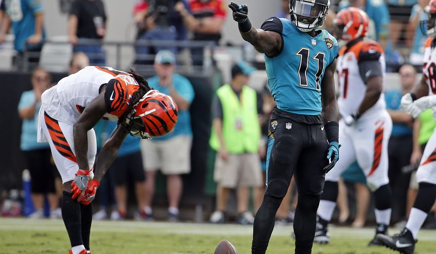 Jacksonville Jaguars wide receiver Marqise Lee (11) points after making a first down against the Cincinnati Bengals during the first half of an NFL football game, Sunday, Nov. 5, 2017, in Jacksonville, Fla. (AP Photo/Stephen B. Morton)