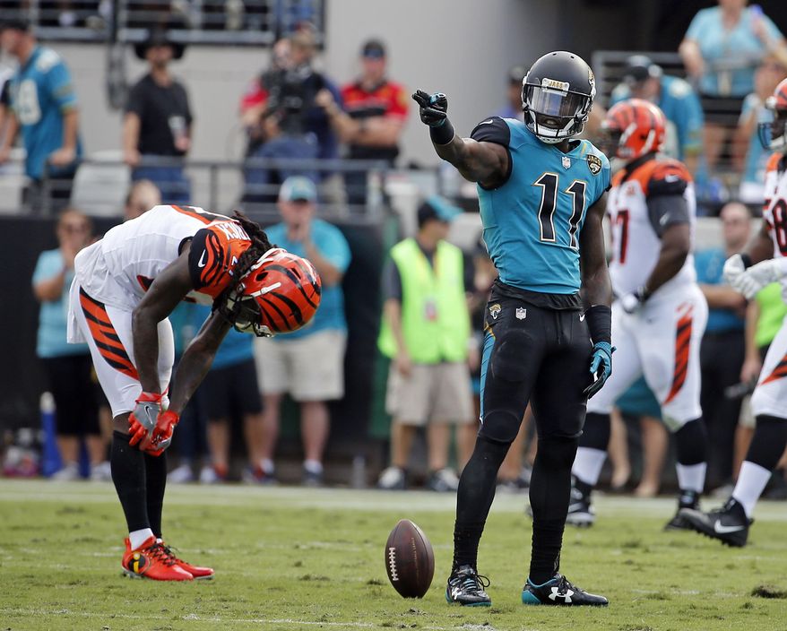Jacksonville Jaguars wide receiver Marqise Lee (11) points after making a first down against the Cincinnati Bengals during the first half of an NFL football game, Sunday, Nov. 5, 2017, in Jacksonville, Fla. (AP Photo/Stephen B. Morton)