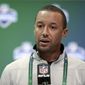 FILE- in this March 1, 2017, file photo, Cleveland Browns general manager Sashi Brown speaks during a press conference at the NFL Combine in Indianapolis. Sashi Brown dismissed the idea he sabotaged the trade with Cincinnati for quarterback AJ McCarron that fell apart last week. The teams failed to submit the proper paperwork to complete the trade before the NFL’s 4 p.m. deadline, and the inability to execute the deal led to speculation that Brown intentionally scuttled the swap. Brown said that narrative “is wholly untrue.” (AP Photo/Michael Conroy, File) **FILE**
