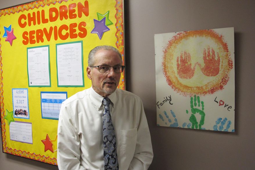 In this Nov. 2, 2017, photo, John Fisher, director of Licking County Job & Family Services, discusses in Newark, Ohio. Ohio's opioid crisis is stretching the state's foster care system as more and more children are removed from the homes of their drug-addicted parents, leading to ballot requests Tuesday for more funding. The agency is then asking voters to approve $3.9 million in additional annual funding, on top of the same amount the department already receives. It's the first request for new money in more than three decades, said Fisher. (AP Photo/Andrew Welsh-Huggins)