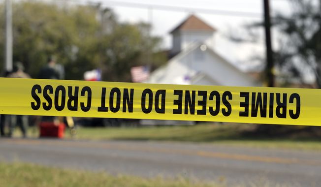 Law enforcement officials continue to investigate the scene of a shooting at the First Baptist Church of Sutherland Springs, Tuesday, Nov. 7, 2017, in Sutherland Springs, Texas. A man opened fire inside the church in the small South Texas community on Sunday, killing and wounding many. (AP Photo/Eric Gay)