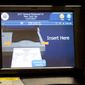 In this file photo, the screen of an electronic voting machine is displayed, Tuesday, Nov. 7, 2017, in the Staten Island borough of New York. (AP Photo/Mark Lennihan) **FILE**