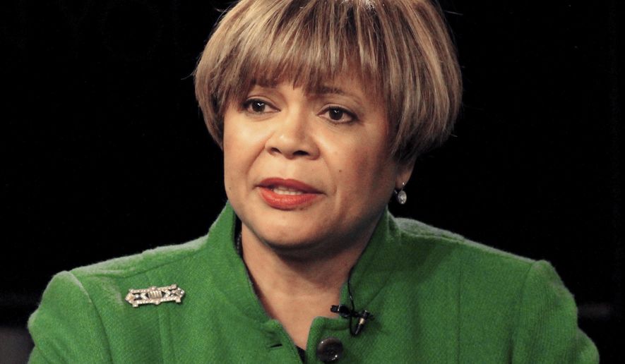 FILE - In this Nov. 1, 2017, file photo, Charlotte Mayor Pro Tem Vi Lyles answers a question during a mayoral debate. Lyles is opposed by Charlotte City Councilman Kenny Smith in the general election. Lyles claimed victory Tuesday night, Nov. 7, in the race to become the next mayor of North Carolina's largest city. (AP Photo/Skip Foreman, File)