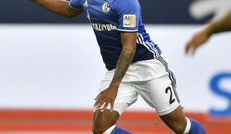 FILE - In this Sept. 10, 2017, file photo, Schalke&#39;s Weston McKennie runs for the ball during the German Bundesliga soccer match against VFB Stuttgart at the Arena in Gelsenkirchen, Germany. McKennie could make his U.S. national team debuts in a Nov. 14 exhibition at Portugal. (AP Photo/Martin Meissner, File)