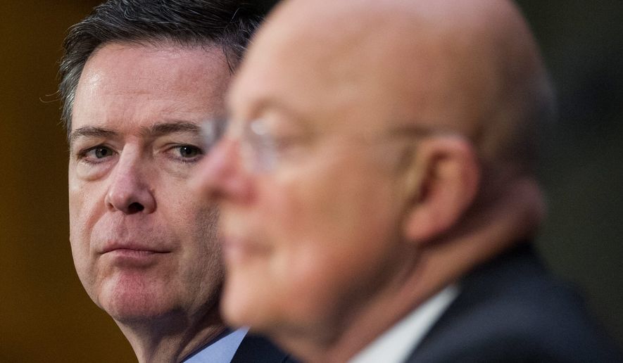 FBI Director James B. Comey (left), with Director of National Intelligence James R. Clapper, was vague in Senate testimony about Russian intelligence activities, but it was shocking and perplexing in hallways of U.S. spy agencies. (Associated Press/File)