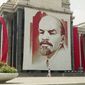A poster of Vladimir Lenin, founder of the Soviet state, hangs on a wall of the Moscow library. (Associated Press/File)