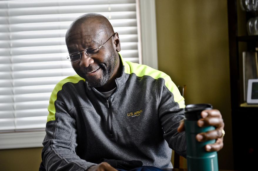 FILE - In a Wednesday, Nov. 8, 2017 file photo, Wilmot Collins, newly elected Helena, Mont. mayor, speaks with the press in his Helena, Mont. home. Fifty years to the date after the nation’s first black mayor was elected to lead a large American city, voters in more than a half-dozen large and small cities chose African-American candidates as mayors on Tuesday. (Thom Bridge/Independent Record via AP, File)
