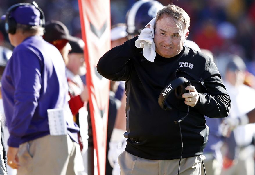 FILE - In this Saturday, Oct. 28, 2017, file photo TCU head coach Gary Patterson walks on the sideline during the first half of an NCAA college football game against Iowa State in Ames, Iowa. Patterson doesn’t recall ever before having to prepare to play a team averaging more than 600 yards a game. Well, he is now for a matchup of the Big 12 co-leaders with likely playoff implications. (AP Photo/Charlie Neibergall, File)