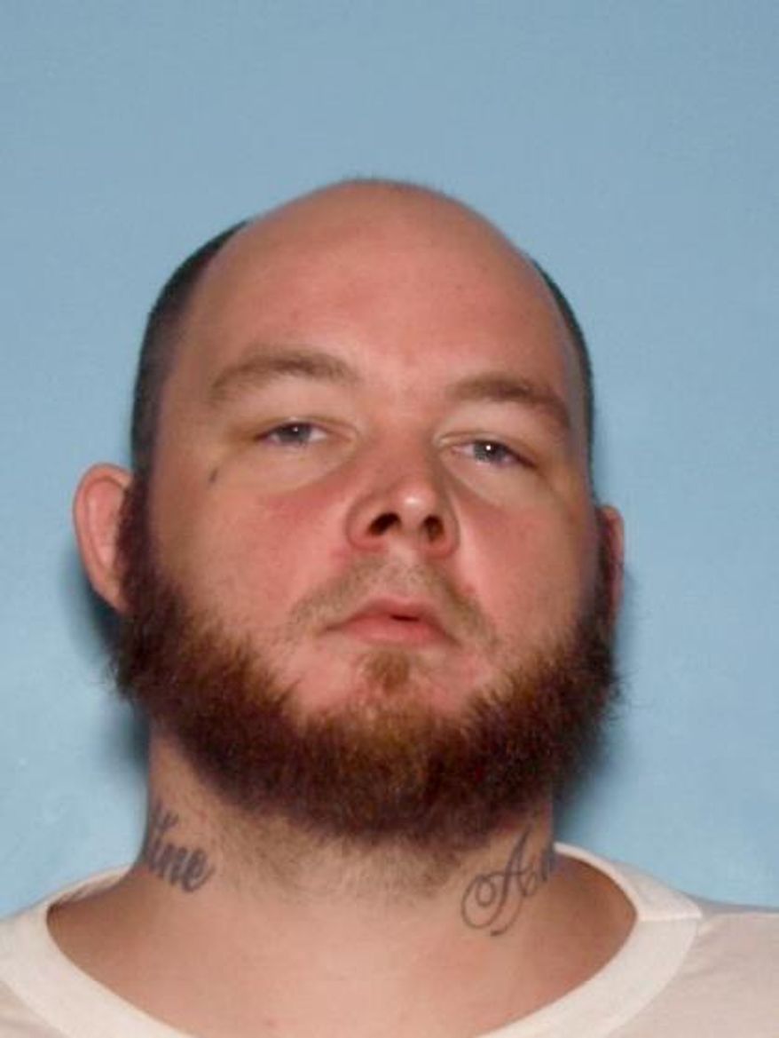 This photo provided by the Forest Park Police shows James Bailey. Bailey exchanged gunfire with two police officers, Wednesday, Nov. 8, 2017, hitting and wounding both of them, and was later found dead behind a home south of Atlanta, police said. (Forest Park Police via AP)