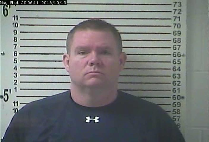 FILE - This Oct. 13, 2016, file photo released by the Hardin County Detention Center, shows Stephen Kyle Goodlett, the former principal of LaRue County, Ky. Goodlett, who pleaded guilty to child pornography charges stemming from uploaded nude images of a student whose cellphone he confiscated is set to be sentenced Thursday, Nov. 9, 2017, in U.S. District Court in Louisville. (Hardin County Detention Center via AP, File)
