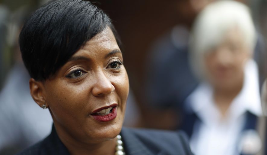 FILE - In this Tuesday, Nov. 7, 2017 file photo, Atlanta city councilwoman and mayoral candidate Keisha Lance Bottoms talks to the press after voting at a polling site in Atlanta. Atlanta’s next mayor could be named Keisha, which some say is befitting the city already regarded as America’s “black mecca.” Bottoms is the latest in a list of black candidates whose racial identity on the ballot is clearer than ever. (AP Photo/David Goldman, File)