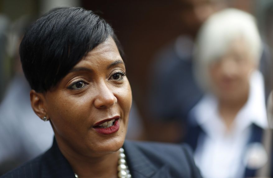 FILE - In this Tuesday, Nov. 7, 2017 file photo, Atlanta city councilwoman and mayoral candidate Keisha Lance Bottoms talks to the press after voting at a polling site in Atlanta. Atlanta’s next mayor could be named Keisha, which some say is befitting the city already regarded as America’s “black mecca.” Bottoms is the latest in a list of black candidates whose racial identity on the ballot is clearer than ever. (AP Photo/David Goldman, File)