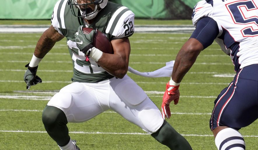 FILE - In this Oct. 15, 2017, file photo, New York Jets running back Matt Forte (22) attempts to get by New England Patriots middle linebacker Dont'a Hightower (54) during the first half of an NFL football game, in East Rutherford, N.J. Forte has been ruled out against the Tampa Bay Buccaneers on Sunday because of swelling in his surgically repaired right knee. (AP Photo/Bill Kostroun, File)