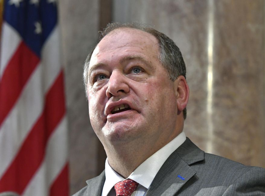 FILE - In this Jan. 3, 2017 file photo, Jeff Hoover looks up to the cheers from the gallery following his swearing in Frankfort, Ky. Kentucky's former Republican House speaker has been hospitalized days after resigning his leadership position amid sexual harassment allegations. A family member says Hoover had a heart-related issue and has asked for privacy until they issue a further statement. (AP Photo/Timothy D. Easley, File)