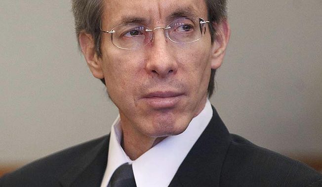 FILE - In this Nov. 15, 2010 file pool photo, Warren Jeffs sits in the Third District Court in Salt Lake City. A daughter of polygamous sect leader Jeffs said he sexually abused her for years when she was a child growing up in the secretive group, according to an interview aired Friday, Nov. 10, 2017, on "Megyn Kelly Today." Rachel Jeffs, now 33, said the abuse began when she was 8 and happened countless times, despite her mother's attempt to intervene, before she confronted him about it in a letter at age 16. (AP Photo/Trent Nelson, Pool, File)