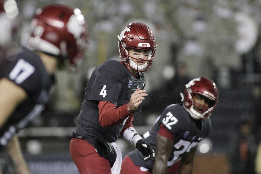FILE - In this Oct. 21, 2017, file photo, Washington State quarterback Luke Falk (4) calls a play during the first half of the team's NCAA college football game against Colorado in Pullman, Wash. Washington State coach Mike Leach declined to call Saturday's matchup against Utah a do-or-die game in the quest to win the Pac-12 North and a berth in the league title game, but it basically is. (AP Photo/Young Kwak, File)