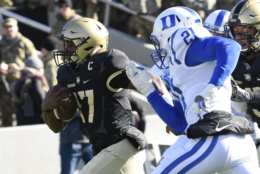 Army quarterback Ahmad Bradshaw (17) runs the ball for a touchdown past Duke safety Alonzo Saxton II (21) during the first half of an NCAA college football game on Saturday, Nov. 11, 2017, in West Point, N.Y. (AP Photo/Hans Pennink)