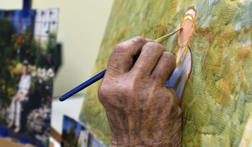In this Saturday, Oct. 28, 2017 photo, Bob Martens paints during a class at the Hobby Lobby in Kalispell, Mont. You’re never too old to learn a new skill, or so the saying goes. And it’s certainly proven true for 90-year-old Kalispell resident Robert “Bob” Martens, who is celebrating his first public art display in the Black Bear Bistro inside Montana Marie in downtown Kalispell. (Aaric Bryan/The Daily Inter Lake via AP)