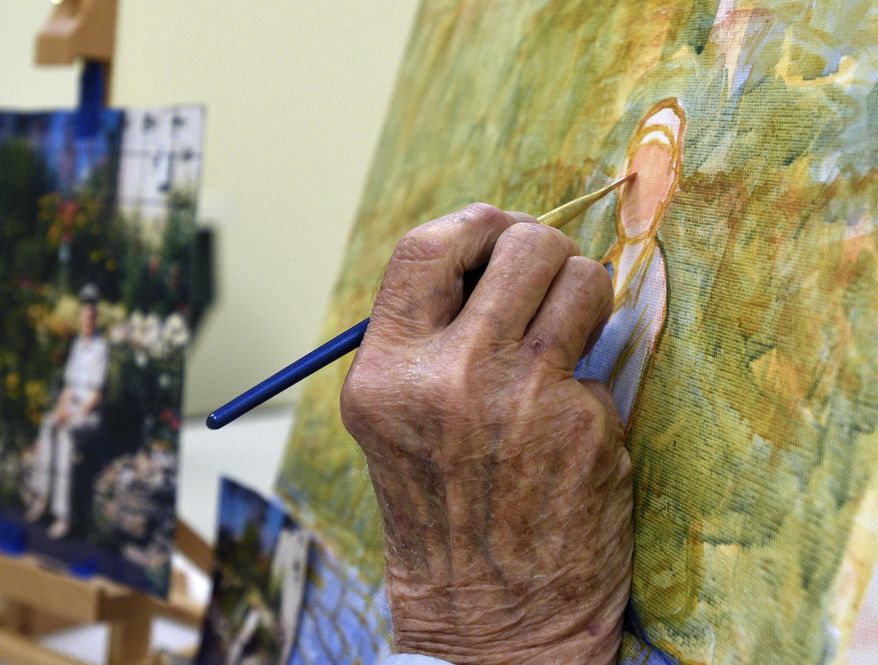 In this Saturday, Oct. 28, 2017 photo, Bob Martens paints during a class at the Hobby Lobby in Kalispell, Mont. You’re never too old to learn a new skill, or so the saying goes. And it’s certainly proven true for 90-year-old Kalispell resident Robert “Bob” Martens, who is celebrating his first public art display in the Black Bear Bistro inside Montana Marie in downtown Kalispell. (Aaric Bryan/The Daily Inter Lake via AP)