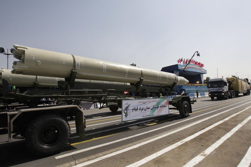 In this Friday, Sept. 21, 2012, photo, a Qiam missile is displayed by Iran's Revolutionary Guard during a military parade commemorating the start of the Iraq-Iran war in front of the mausoleum of the late revolutionary founder Ayatollah Khomeini just outside Tehran, Iran. Saudi Arabia and the U.S. now accuse Iran of supplying ballistic missiles to Shiite rebels in Yemen, including this model. (AP Photo/Vahid Salemi) **FILE**