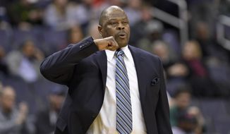 Georgetown head coach Patrick Ewing gestures during the first half of an NCAA college basketball game against Jacksonville, Sunday, Nov. 12, 2017, in Washington. (AP Photo/Nick Wass) **FILE**
