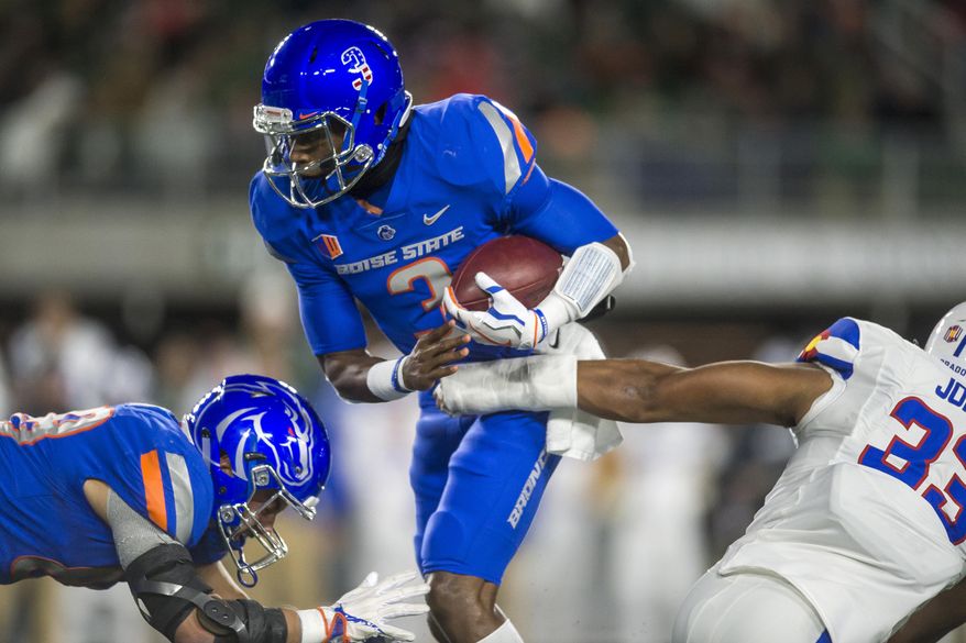 Boise State quarterback Montell Cozart is sacked by Colorado State linebacker Emmanuel Jones during the first quarter of an NCAA college football game Saturday, Nov. 11, 2017, in Fort Collins, Colo. (Timothy Hurst/The Coloradoan via AP)