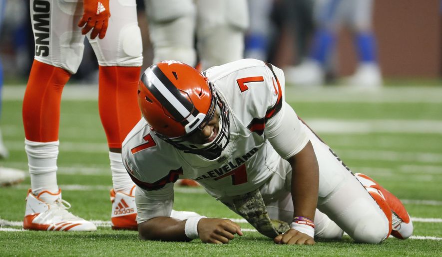 Cleveland Browns quarterback DeShone Kizer reacts after a hit during the second half of an NFL football game against the Detroit Lions, Sunday, Nov. 12, 2017, in Detroit. (AP Photo/Rick Osentoski)