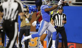 Detroit Lions tight end Eric Ebron runs into the endzone for a 29-yard reception for a touchdown during the second half of an NFL football game against the Cleveland Browns, Sunday, Nov. 12, 2017, in Detroit. (AP Photo/Paul Sancya)