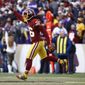 Washington Redskins free safety D.J. Swearinger (36) celebrates his interception of a pass intended for Minnesota Vikings tight end Kyle Rudolph during the second half of an NFL football game against the Minnesota Vikings in Landover, Md., Sunday, Nov. 12, 2017. (AP Photo/Patrick Semansky)