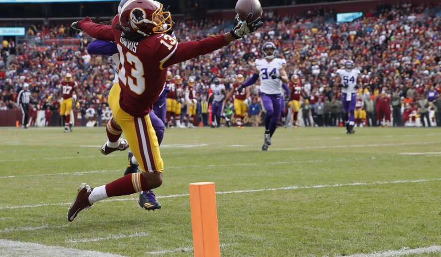 Washington Redskins wide receiver Maurice Harris (13) pulls in a touchdown pass during the first half of an NFL football game against the Minnesota Vikings in Landover, Md., Sunday, Nov. 12, 2017. (AP Photo/Alex Brandon)