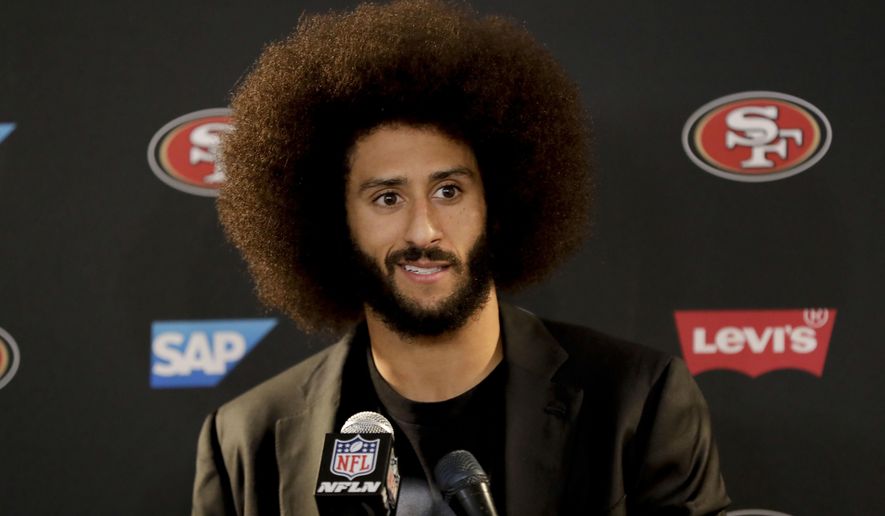 FILE - In this Dec. 24, 2016, file photo San Francisco 49ers quarterback Colin Kaepernick talks during a news conference after an NFL football game against the Los Angeles Rams. The free agent quarterback was named GQ magazine&#39;s &amp;quot;Citizen of the Year&amp;quot; for his activism on Nov. 13, 2017. (AP Photo/Rick Scuteri, File)