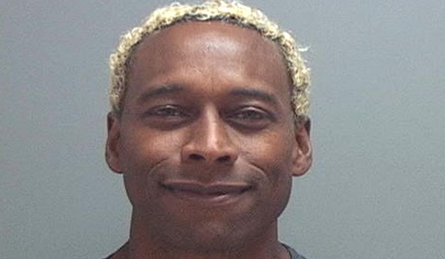 This undated photo provided by the Salt Lake County Jail shows Anthony D. McClanahan. Prosecutors say McClanahan, a former professional football player, sliced his wife's neck and then crawled on the ground outside their rented Utah condominium before flagging down a police officer. Murder charges filed Monday against McClanahan say the bloody Nov. 2 scene in Park City indicated his 28-year-old wife Keri "KC" McClanahan put up a desperate struggle. (Salt Lake County Jail via AP)