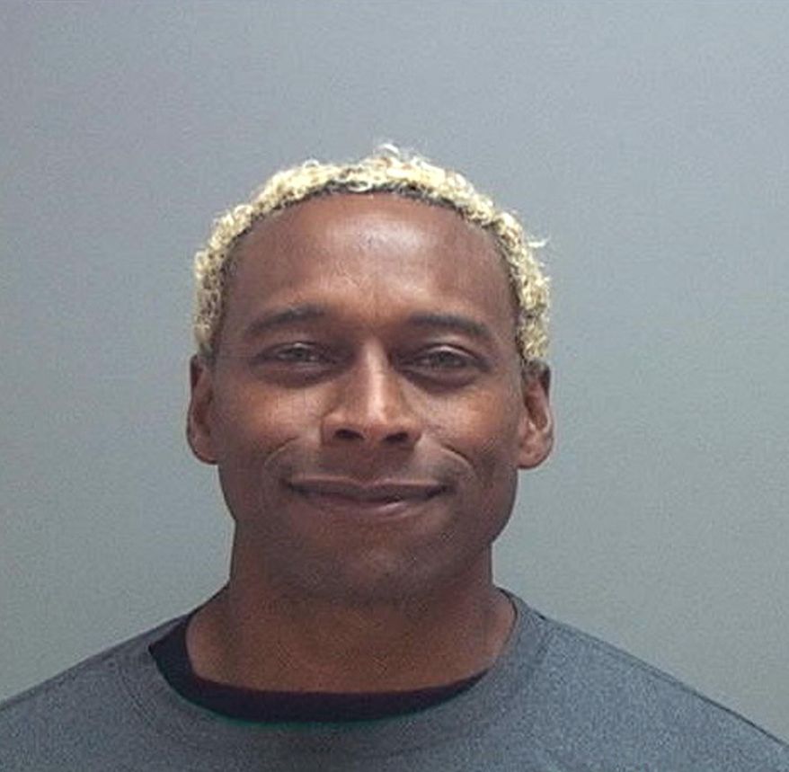 This undated photo provided by the Salt Lake County Jail shows Anthony D. McClanahan. Prosecutors say McClanahan, a former professional football player, sliced his wife's neck and then crawled on the ground outside their rented Utah condominium before flagging down a police officer. Murder charges filed Monday against McClanahan say the bloody Nov. 2 scene in Park City indicated his 28-year-old wife Keri "KC" McClanahan put up a desperate struggle. (Salt Lake County Jail via AP)