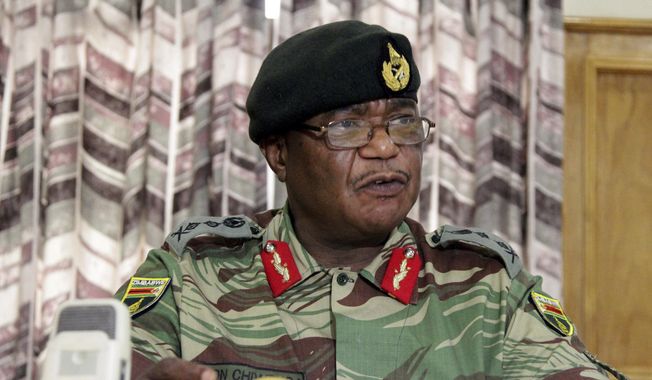 Zimbabwe&#x27;s Army Commander, Constantino Chiwenga addresses a press conference in Harare, Monday, Nov. 13, 2017. The army commander Monday criticized the instability in the country’s ruling party caused by President Robert Mugabe who last week fired a vice president. (AP Photo/Tsvangirayi Mukwazhi)