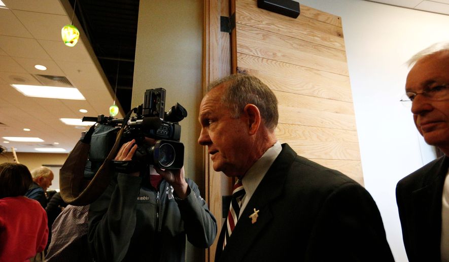 A new study comparing broadcast coverage of Roy Moore and Sen. Bob Menendez finds Mr. Moore garnering 40-times more coverage than the Democratic lawmaker, who faces corruption charges. (Associated Press)