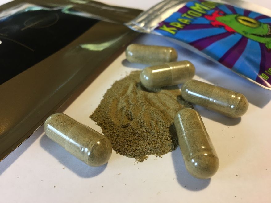 In this Sept. 27, 2017, file photo, kratom capsules are displayed in Albany, N.Y. Federal health authorities on Tuesday, Nov. 14, are warning about reports of injury, addiction and death with the herbal supplement that has been promoted as an alternative to opioid painkillers and other prescription drugs. (AP Photo/Mary Esch, File)