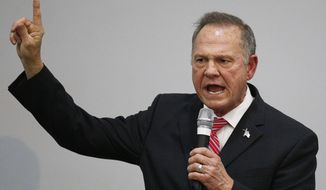 Former Alabama Chief Justice and U.S. Senate candidate Roy Moore speaks at a church revival, Tuesday, Nov. 14, 2017, in Jackson, Ala. (AP Photo/Brynn Anderson)