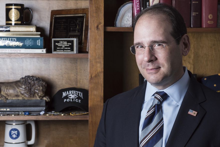 In this Oct. 19, 2017, photo, Attorney Lance LoRusso, a former police officer who is now a lawyer and represents officers involved in use-of-force cases, poses for a portrait in his office in Atlanta. LoRusso is among those involved in law enforcement who believe officers should be allowed to view bodycam video footage before writing reports or being interviewed by investigators. (AP Photo/Lisa Marie Pane)