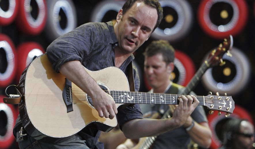 FILE - In this July 7, 2007, file photo, Dave Matthews Band performs during the Live Earth concert at Giants Stadium in East Rutherford, N.J. The Dave Matthews Band will perform in St. Paul, Minn., on the eve of the Super Bowl, adding to a growing list of entertainment leading up to the big game. The Matthews Band will play at Xcel Energy Center on Feb. 3, in St. Paul, as part of the so-called Night Before concert. (AP Photo/Tim Larsen File)