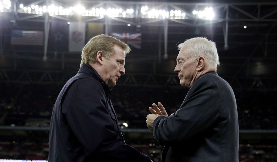 FILE - In this Nov. 9, 2014, file photo, NFL Commissioner Roger Goodell, left, and Dallas Cowboys owner Jerry Jones talk at the NFL football game between the Jacksonville Jaguars and the Cowboys at Wembley Stadium in London. The Associated Press has obtained a letter sent to Jerry Jones’ attorney accusing the Cowboys owner of “conduct detrimental to the league’s best interests” over his objection to a contract extension for Goodell. The letter accusing Jones of sabotaging the negotiations was sent to David Boies on Wednesday, Nov. 15, 2017. (AP Photo/Matt Dunham, File) **FILE**