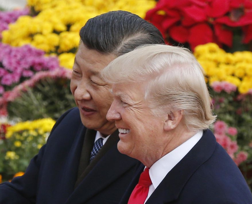 FILE - In this Nov. 9, 2017, file photo, U.S. President Donald Trump, right, chats with Chinese President Xi Jinping during a welcome ceremony at the Great Hall of the People in Beijing. Following Trump&#39;s visit to Beijing, China says it&#39;s sending a high-level special envoy to North Korea amid an extended chill in relations between the neighbors over Pyongyang&#39;s nuclear weapons and missile programs. The official Xinhua News Agency said Wednesday, Nov. 15, 2017, that director of the ruling Communist Party&#39;s International Liaison Department, Song Tao, would travel to Pyongyang on Friday to report on the party&#39;s national congress held in October. (AP Photo/Andy Wong, File)