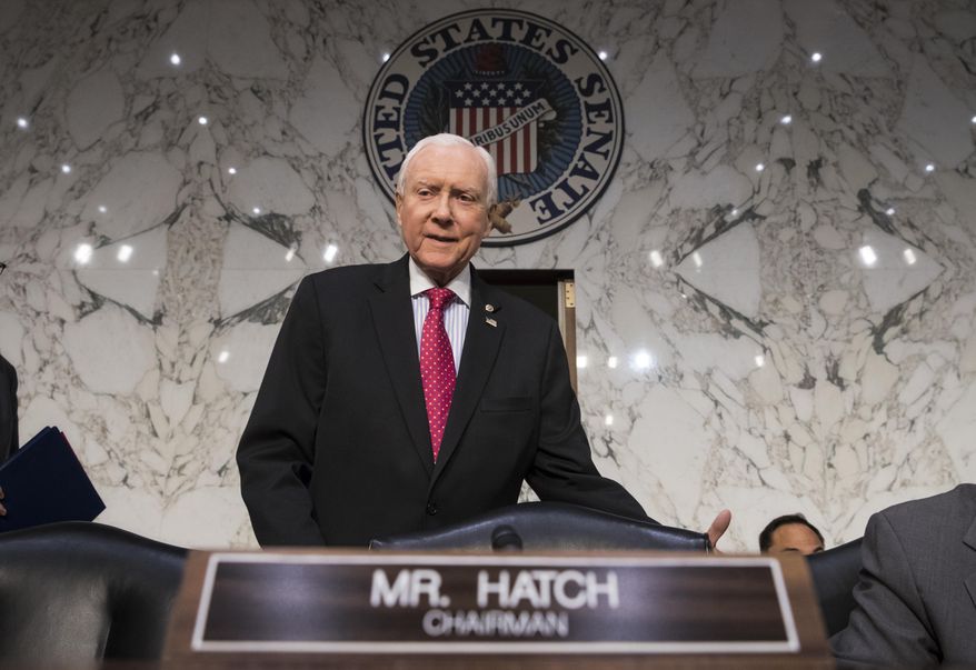 In this Nov. 13, 2017, photo, Senate Finance Committee Chairman Orrin Hatch, R-Utah, arrives as the tax-writing panel begins work on overhauling the nation&#39;s tax code, on Capitol Hill in Washington. Millions would forgo coverage if Congress repeals the unpopular requirement that Americans get health insurance, gambling with their own wellbeing and boosting premiums for others. Just as important, the drive by GOP senators to undo “Obamacare’s” coverage requirement fits in with Trump administration efforts to write regulations allowing for plans with limited benefits and lower premiums.  (AP Photo/J. Scott Applewhite, File)